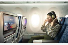 デルタ航空、Spotifyと提携し、機内エンターテインメントで音楽を提供
